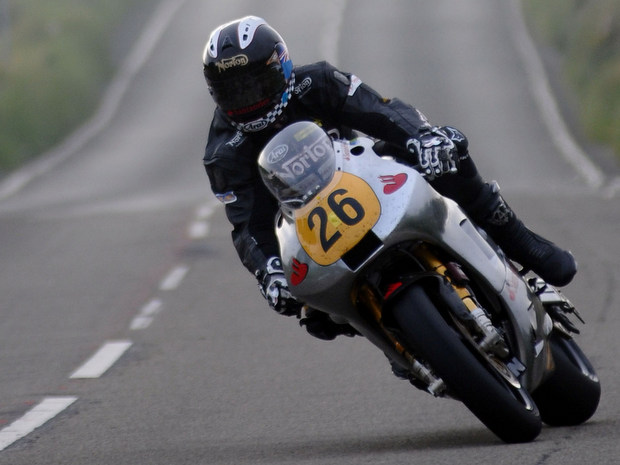 Ian Mackman on the Norton at the 2012 Isle of Man TT fuelled by Monster Energy